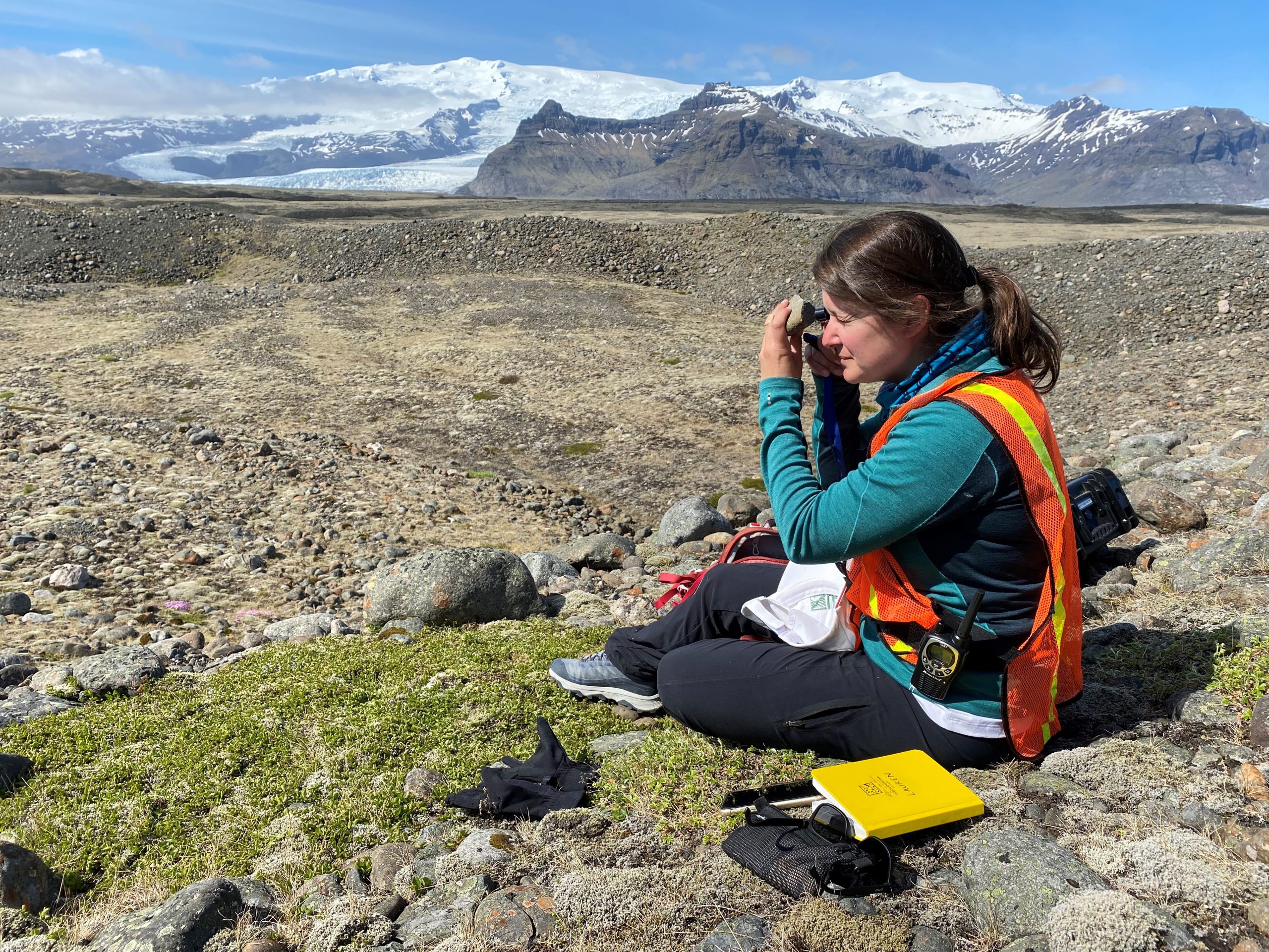 Geologist using a hand lens